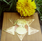 A fixed talisman made in the form of a butterfly